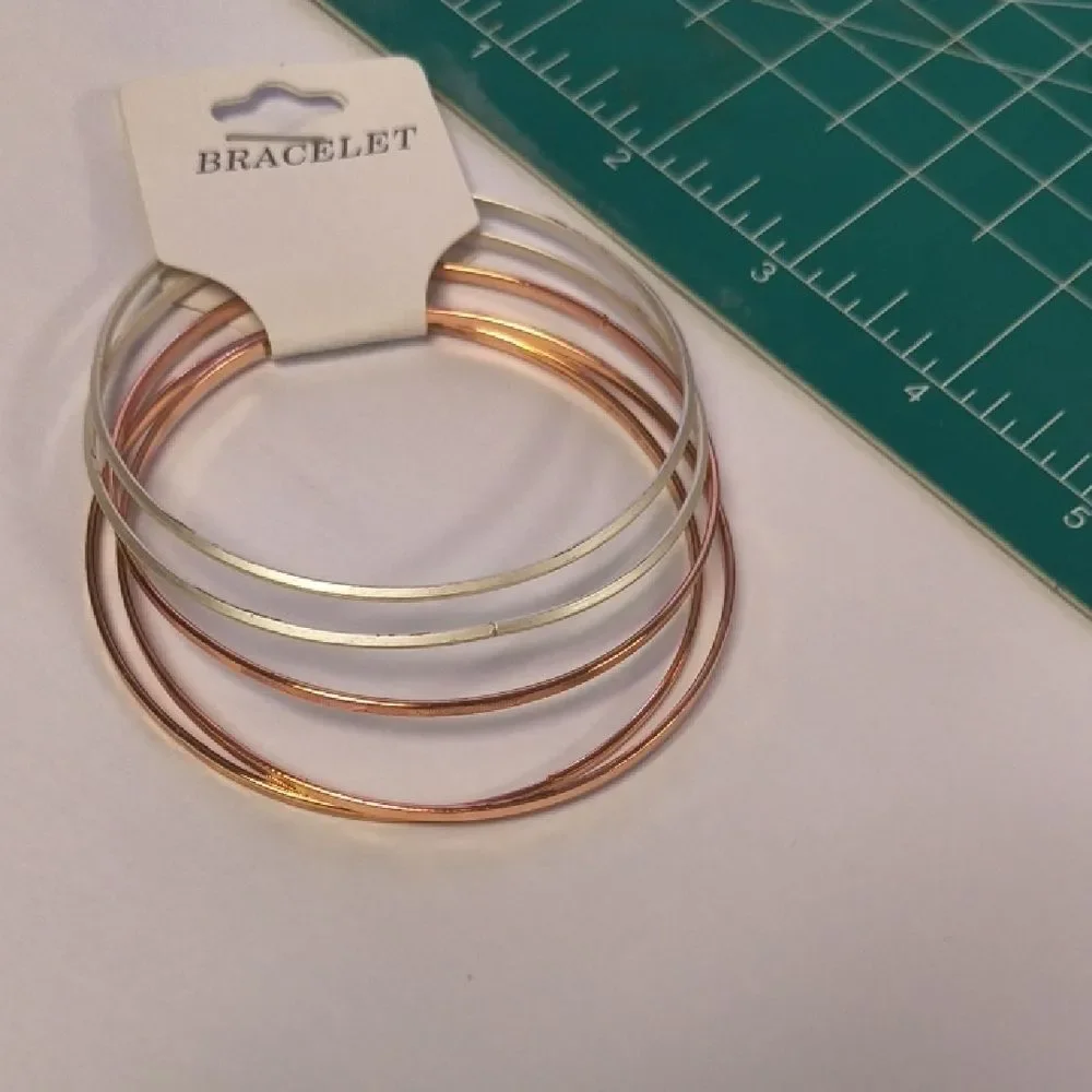 Elegant Silver and Gold Bangle Set